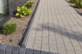 Realizacja Obrzeże chodnikowe grafit 8x25x100cm Polbruk